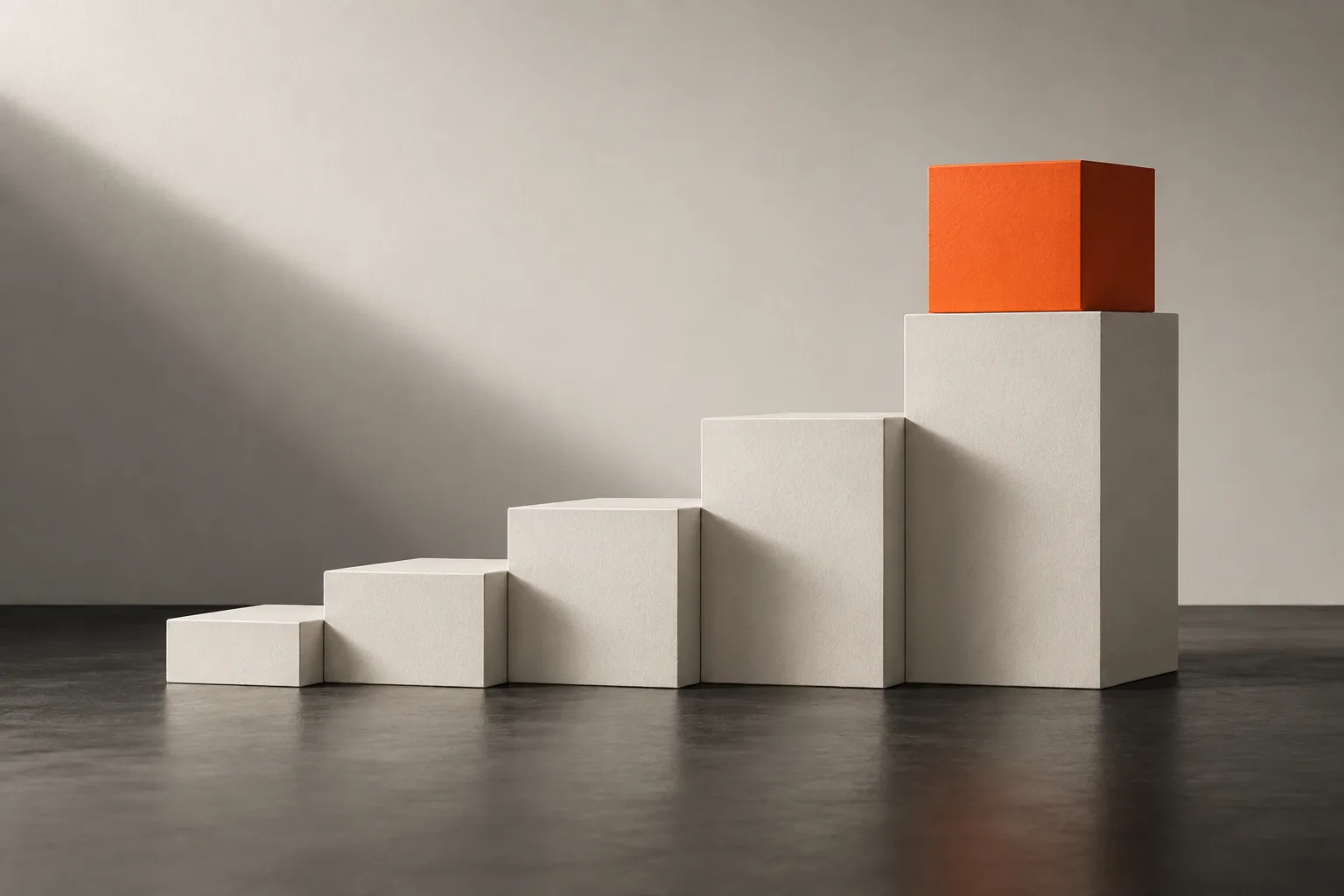 Rising white blocks like steps with an orange block on top: growth without extra headcount.