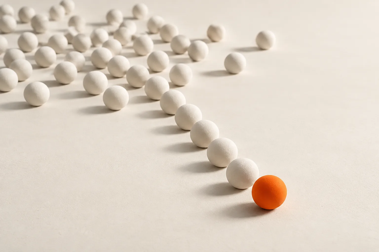 Many white spheres narrowing into a single line that ends in one orange sphere: ranking candidates.